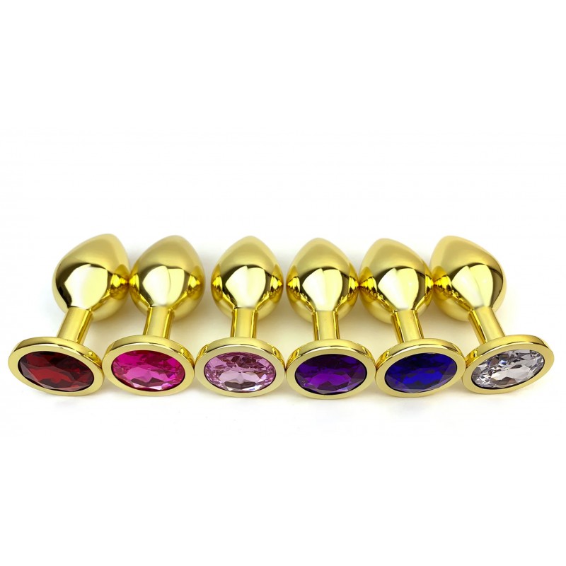 Plug anal metálico dorado con joya